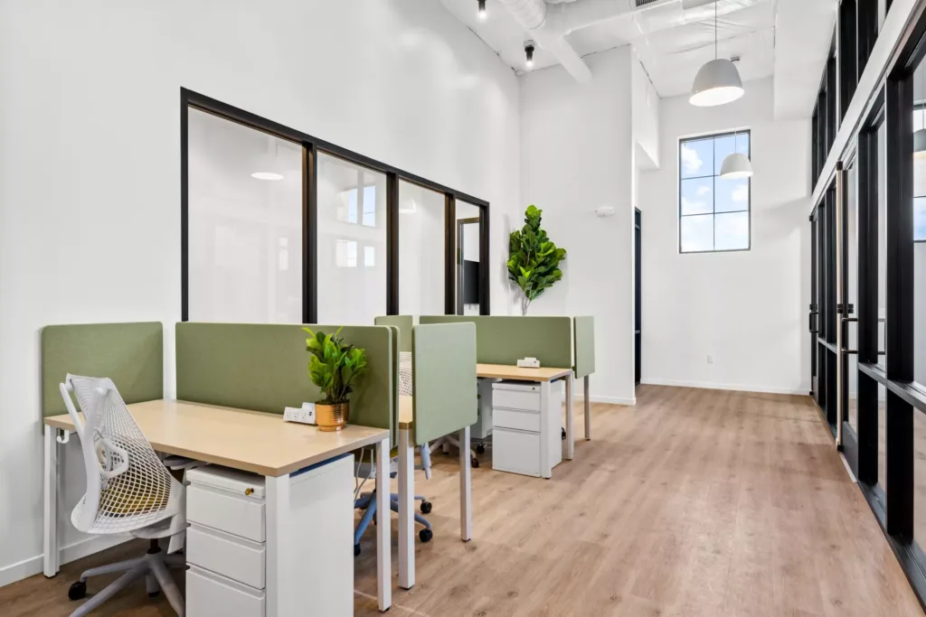 Open coworking office space with high ceilings