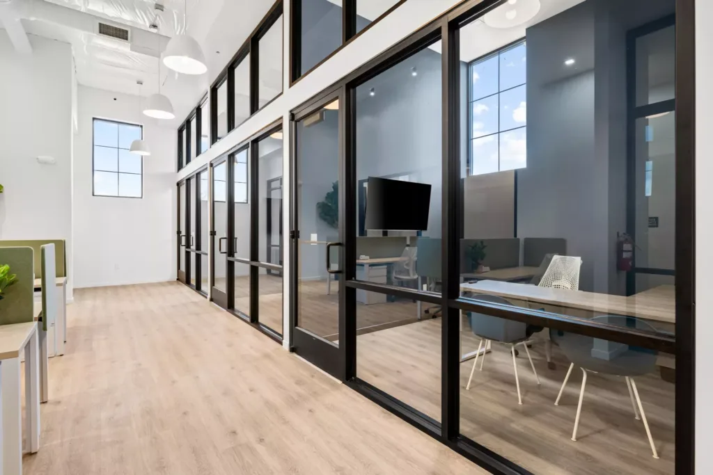 Open coworking office space with high ceilings