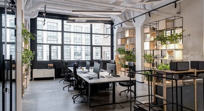 The interior of a modern office building, showing the concept of commercial renovations for energy efficiency